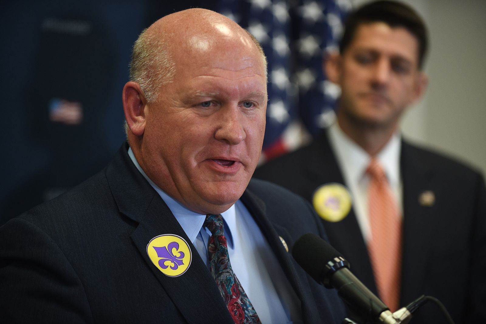 A close up of Glenn "GT" Thompson speaking to the media. In the background, then-Speaker of the House Paul Ryan is seen.