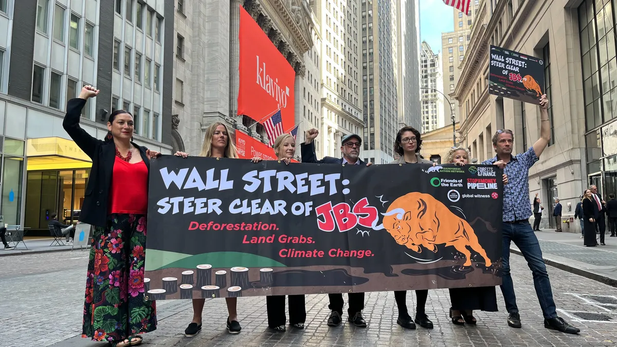 Organizers representing 16 civil society groups demonstrated in front of the New York Stock Exchange on Wednesday morning.